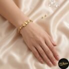 charming butterfly and floral motif with stone